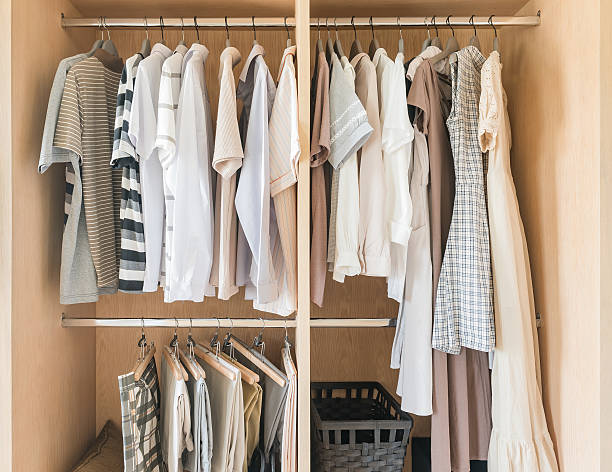 minimal small apartment closet with capsule wardrobe and decluttered layout