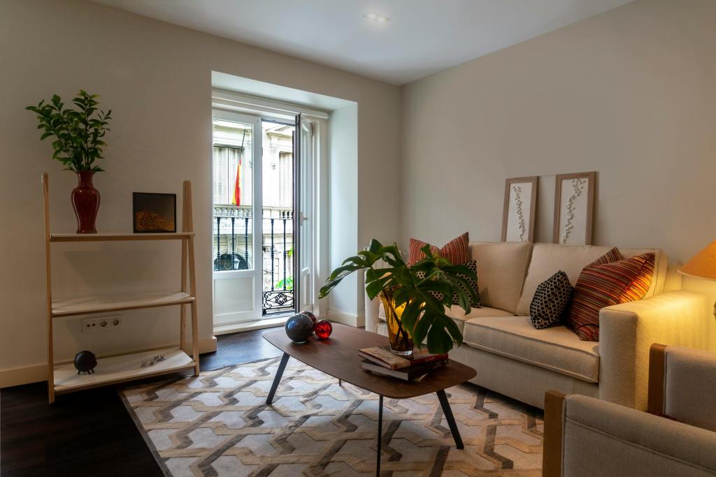 Functional small apartment layout with open pathways and balanced furniture placement