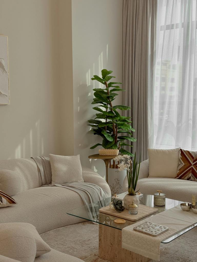 Soft textures and layered decor creating a cozy small apartment aesthetic